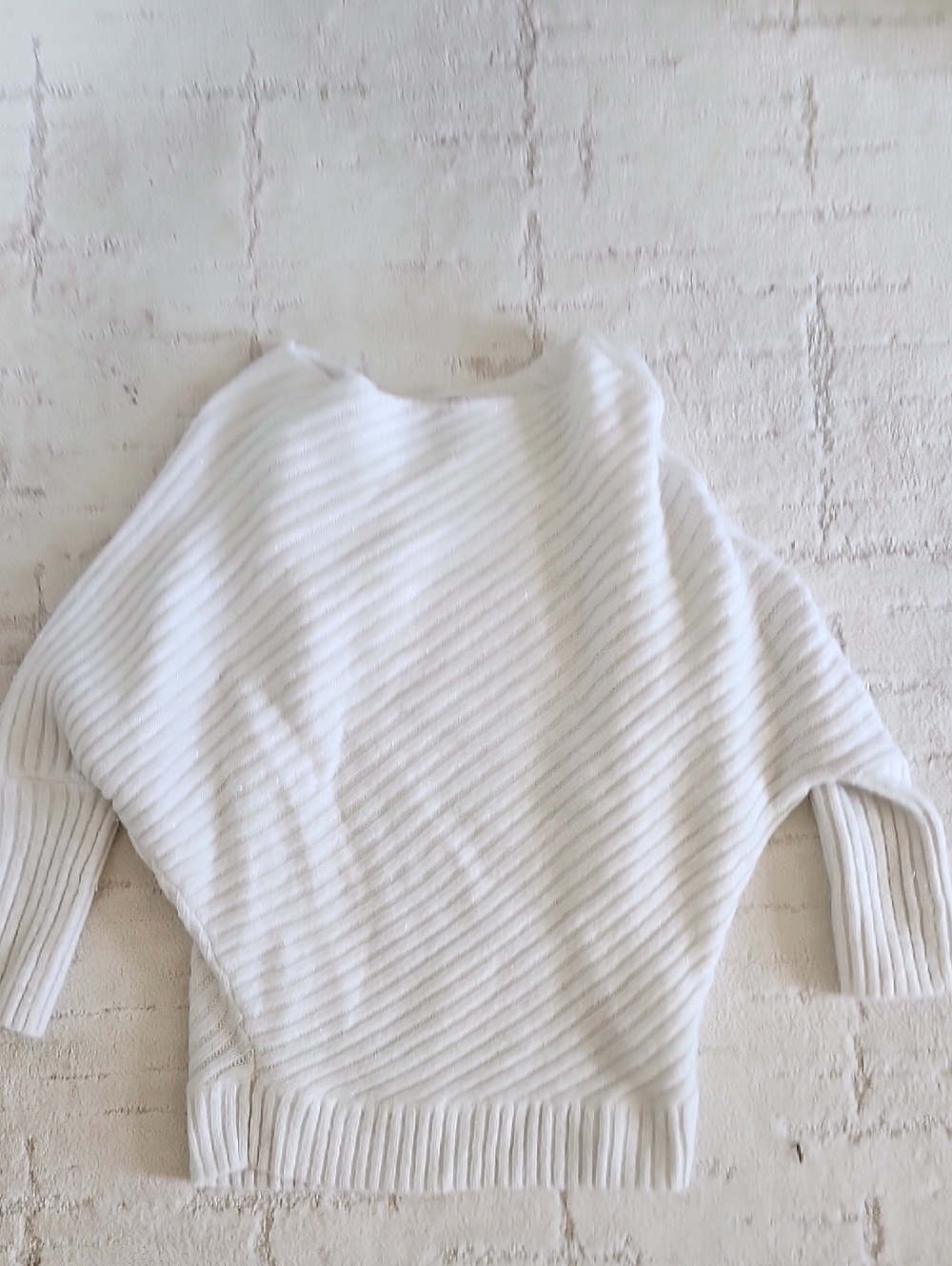 Jennifer Lopez White Ribbed Off Shoulder Sweater